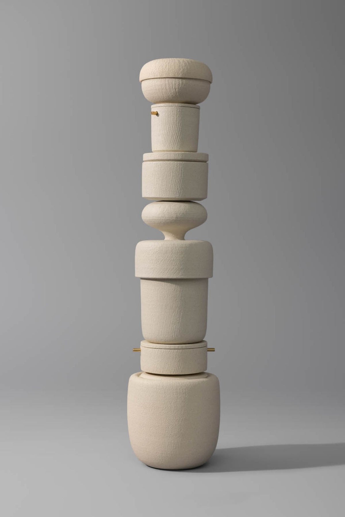 The Memento III ceramic cremation urn stacked with other Vaso cremation urns