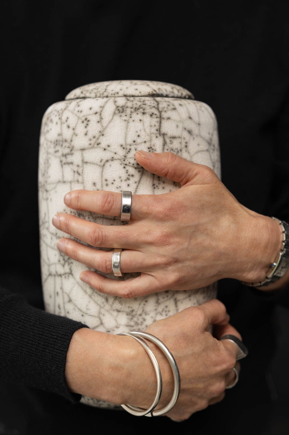 Hands Holding Vaso Urn